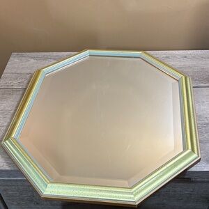 A mid century modern style octagonal mirror vertical or horizontal orientation